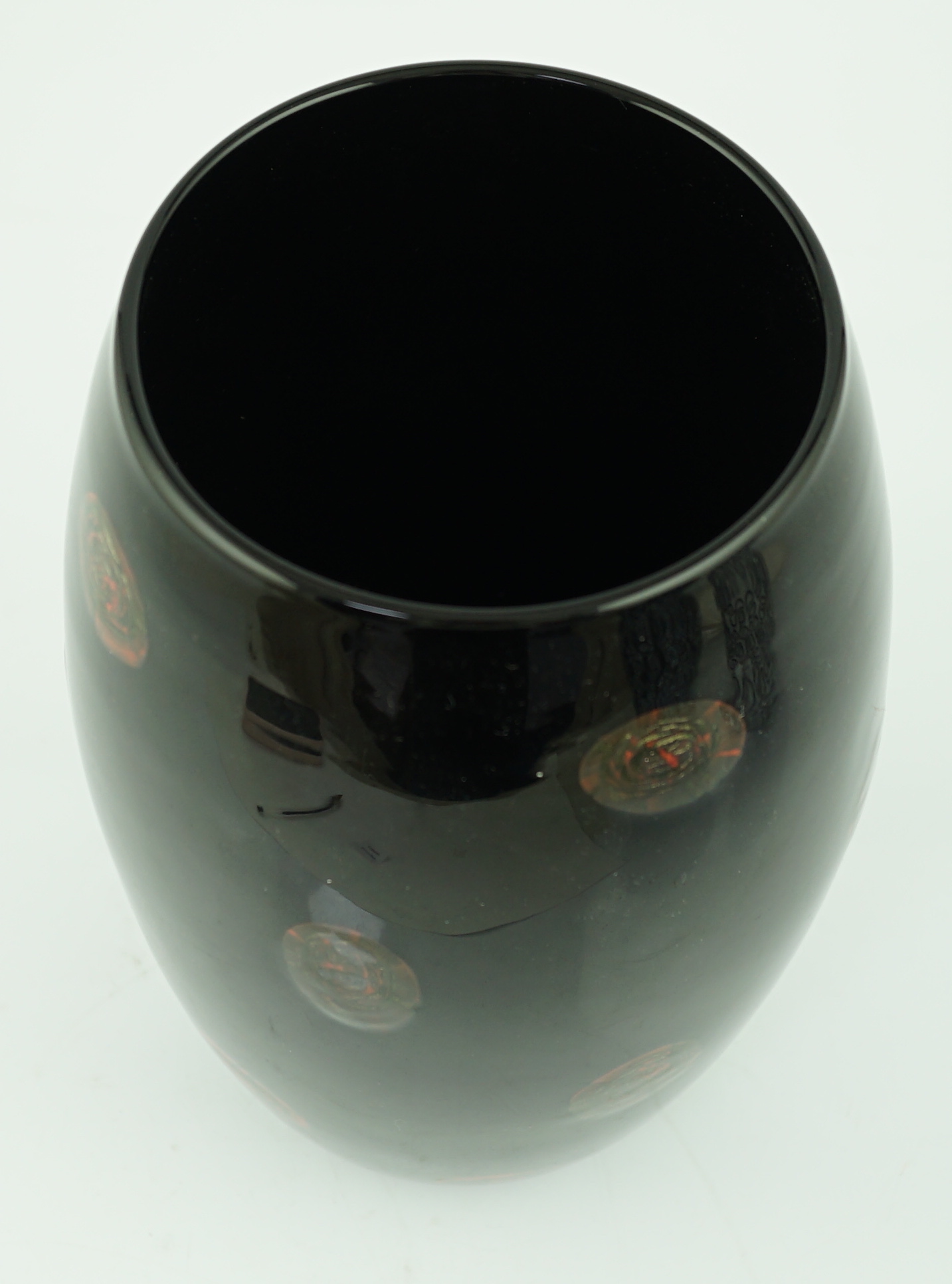 Vittorio Ferro (1932-2012) A Murano glass Murrine vase, with bronze roundels on a black ground, unsigned, 28cm, Please note this lot attracts an additional import tax of 20% on the hammer price